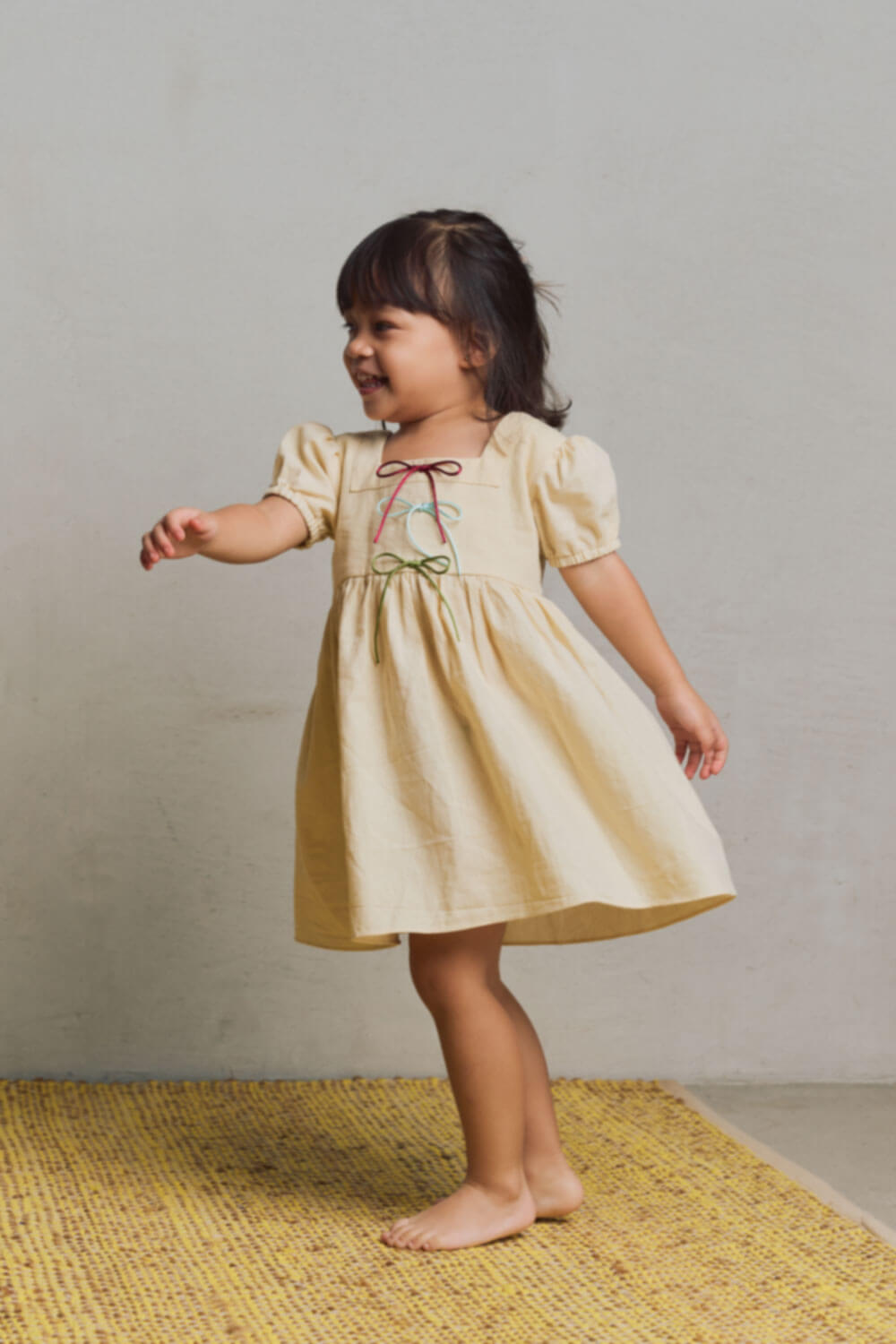 Little Luca Dress / Crema w/ Multicolor Bows
